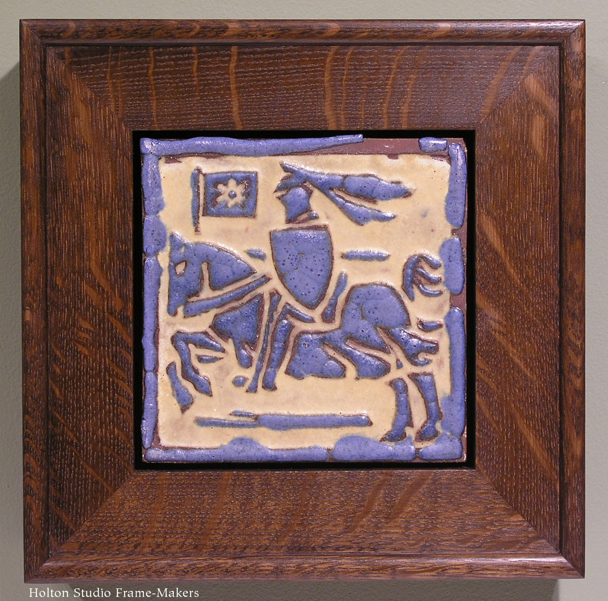 Floor tile showing a knight on horseback (framed, on sale in a picture gallery), cr. 1910, Grueby Faience Company, U.S.A.