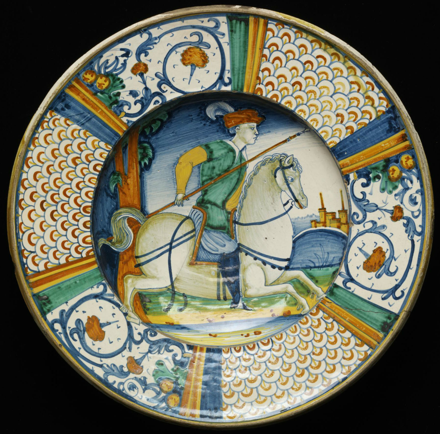 Dish depicting a man carrying a spear on a horse, mid-16th century, possibly Mancini workshop, Deruta