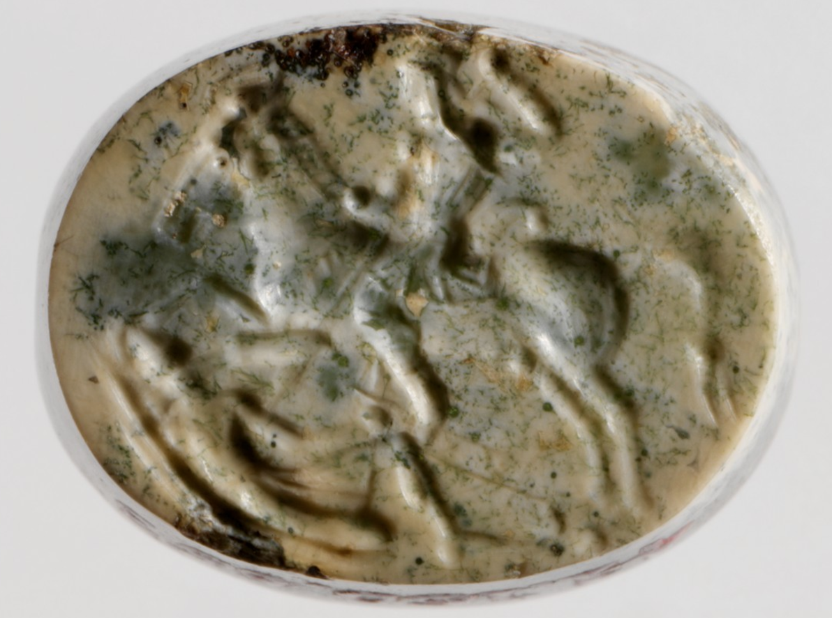 COMPARANDUM: Plasma scarabaeoid seal: Persian Horseman Slaying a Greek with a Spear, cr. 450-400 BC, Greek/Ionian