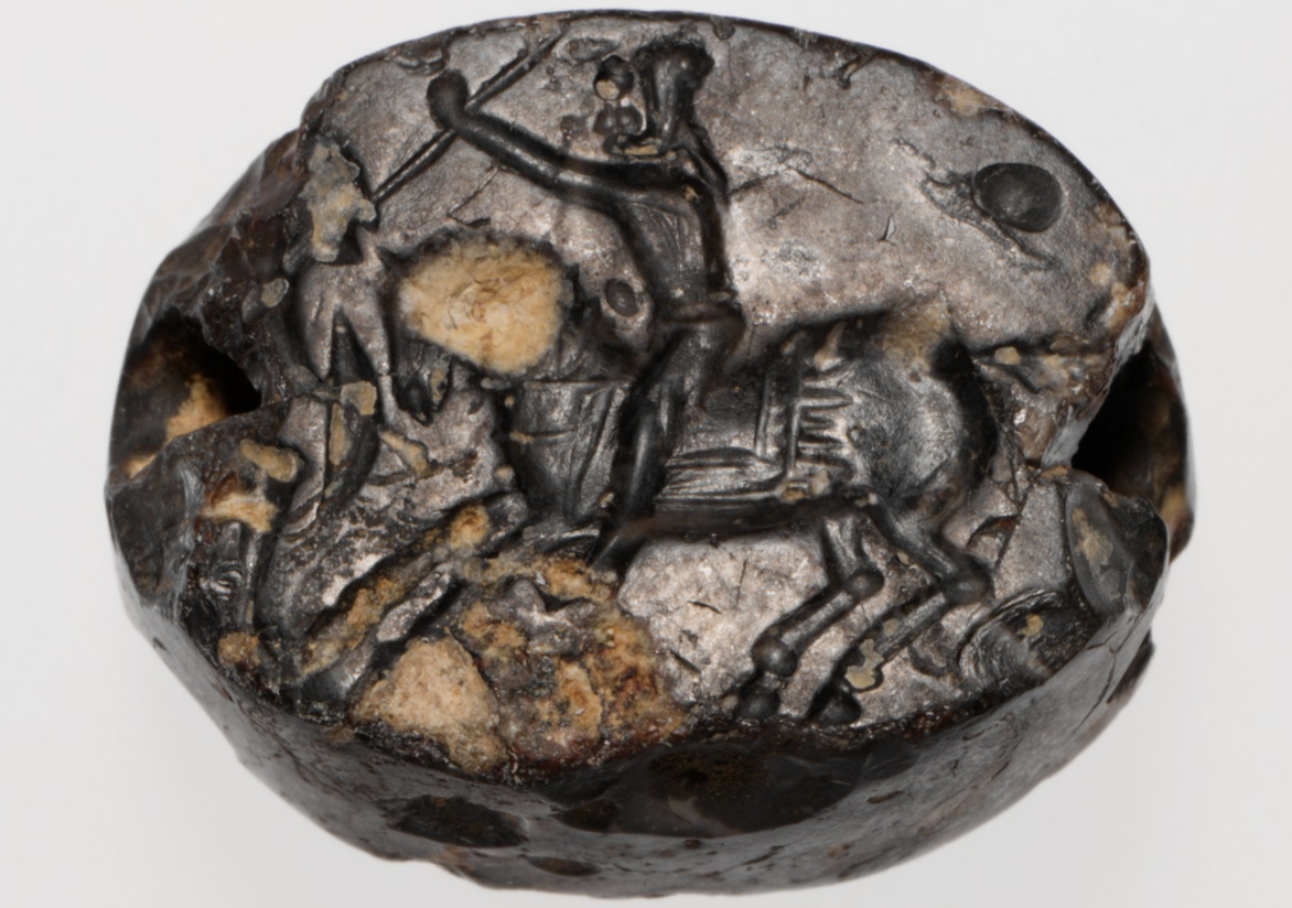 Black jasper scarabaeoid seal: Persian Horseman Slaying a Greek foot soldier with a Spear, 2nd half of the 5th century, Greek/Ionian