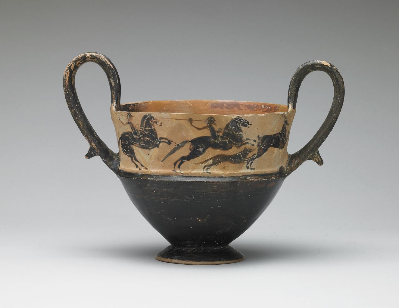 Kantharos with the depiction of two horsemen with spears and dog hunting stag, mid-6th century BC, Boeotian