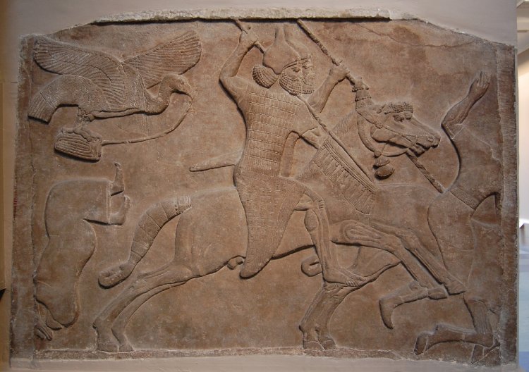 Wall panel relief depicting two Assyrian cavalrymen charging against enemies, cr. 728 BC, Neo-Assyrian (Iraq)