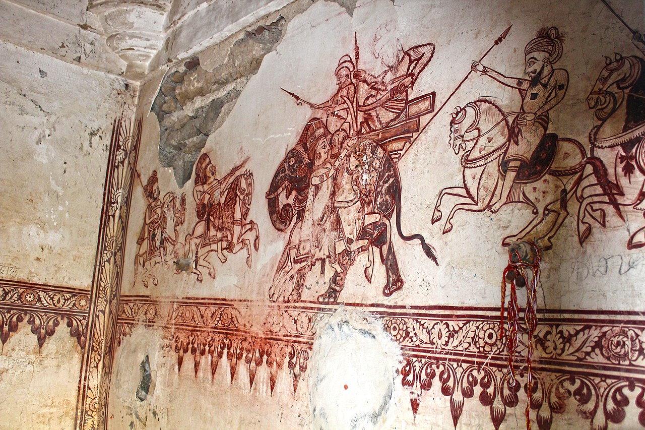 Ajaji on the horse attacking Mirza Aziz Koka on an elephant, Bhuchar Mori memorial shrine mural, 16th-century art, Mughal school, Dhrol, Jamnagar district, Gujarat, India