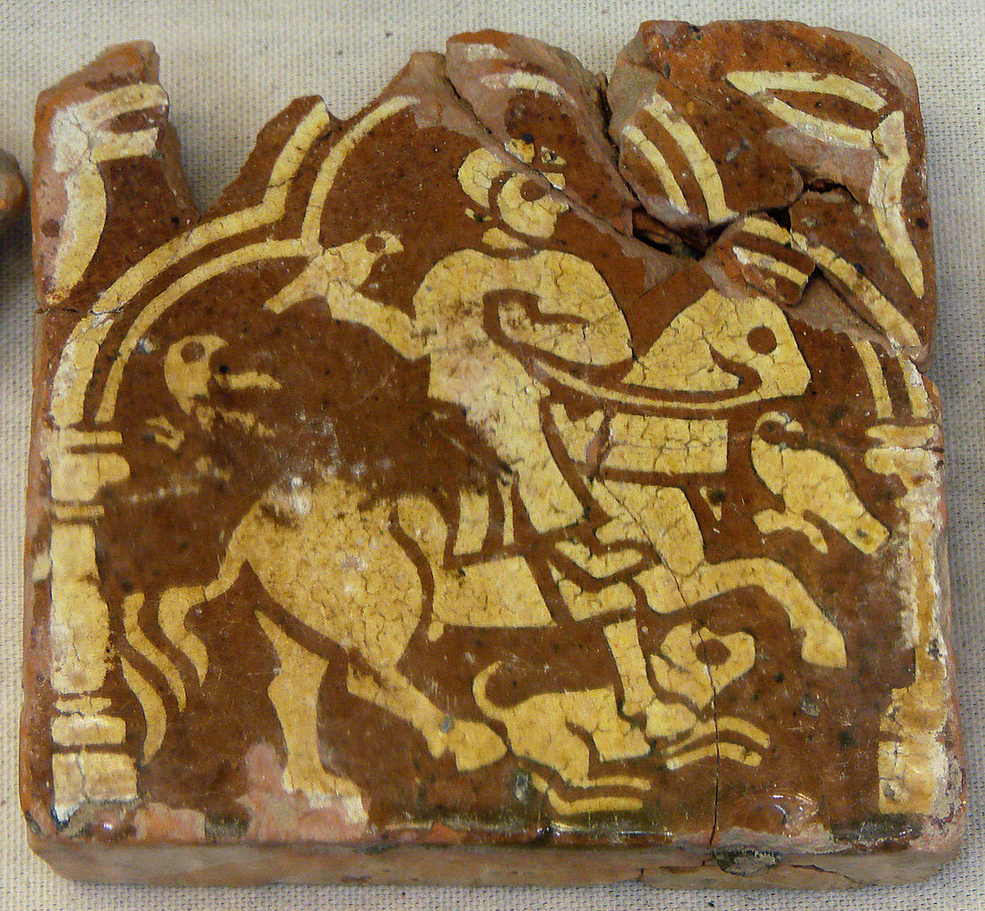 Inlaid tile showing a hunter with a dog, 13th-15th century, Laon region, France