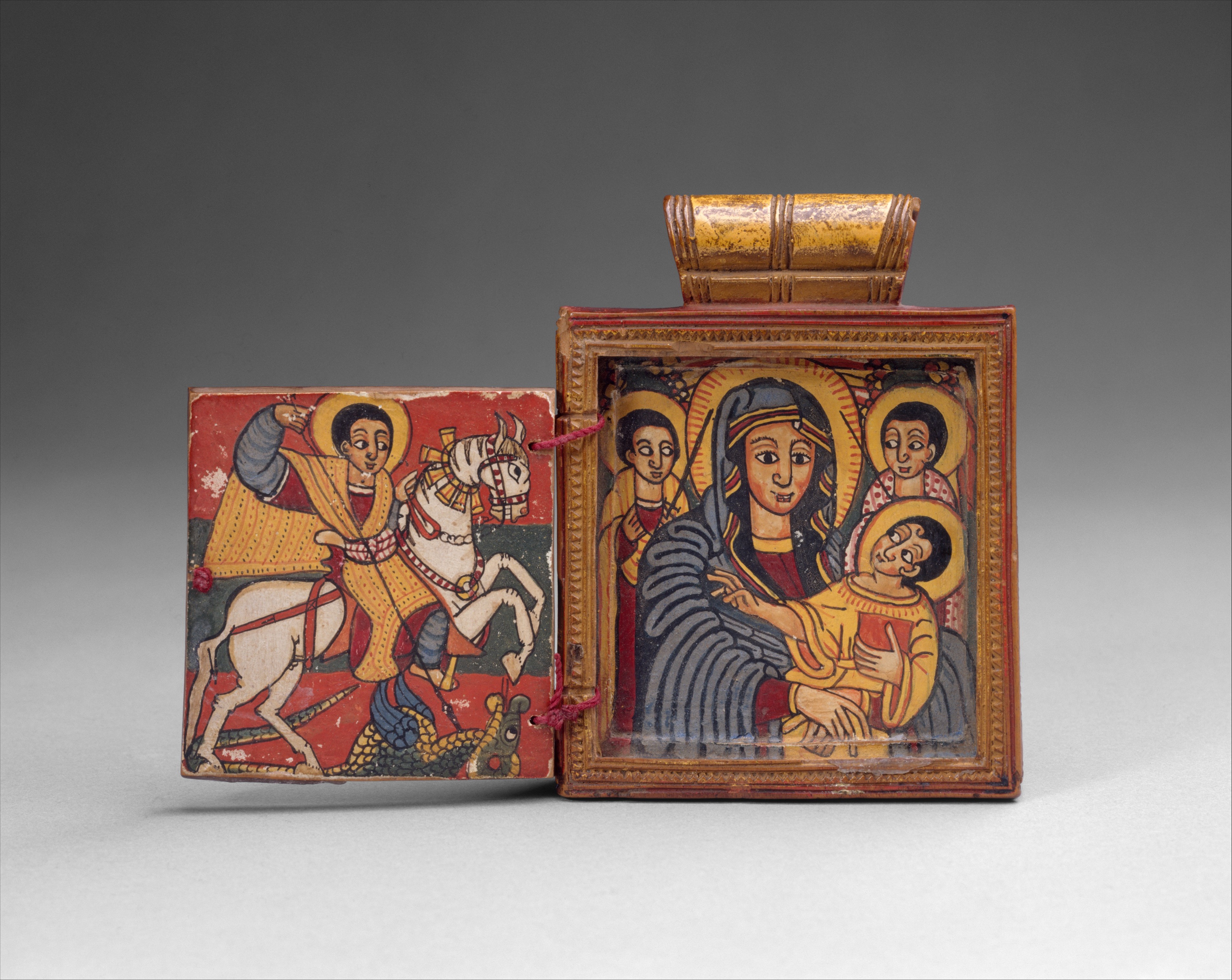Double Diptych Icon Pendant depicting the Virgin Mary, the infant Christ, Saint Michael, Saint Gabriel and Saint George slaying a dragon, early 18th century