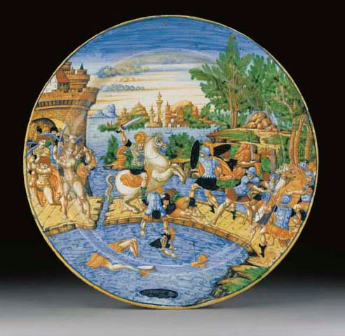 A maiolica plate showing a battle on a drawbridge, cr. 1540, the workshop of Guido da Merlingo, Urbino