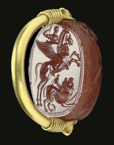 Carnelian scarab and gold finger engraved with Bellerophon and the Chimaera, late 5th century BC, Etruscan