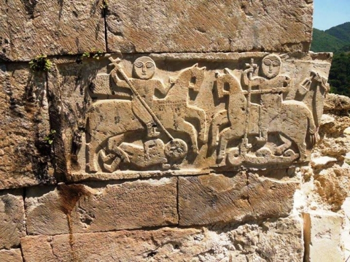 Saint George slaying Diocletian and Saint Theodore slaying a serpent, bas-relief from a 9th-10th-century Georgian monastery