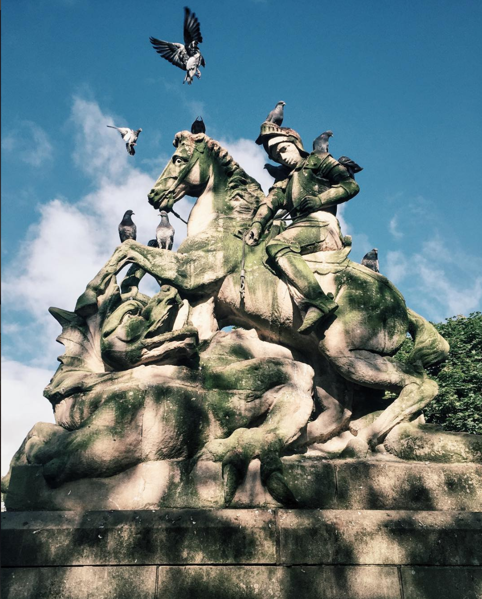 St.George and the Dragon, 1897, J and G Mossman, Glasgow. Originally it was on top of a Co-op building. When the building was demolished in 1980s, it was moved to the ground level