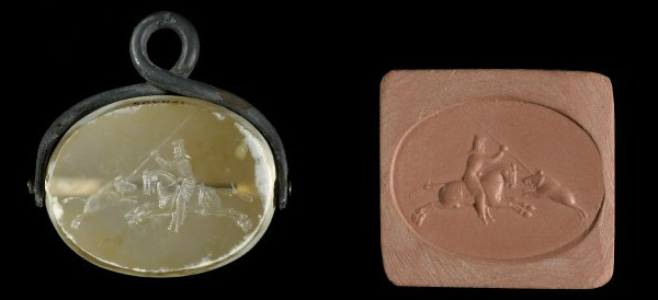 Scaraboid stamp seal with a scene of a rider, possibly a king, in Median dress galloping towards the right and spearing a boar, 5th - 4th century BC